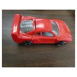 Vintage Tonka car and small Ferrari toy