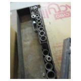 tray with various tools, sockets and wrench