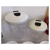 Custard dishes, (2) canisters, plastic cups & metal pitcher