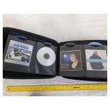 (2) DVD/CD holders 1 full of CDS (See picture for titles)