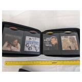 (2) DVD/CD holders 1 full of CDS (See picture for titles)