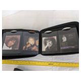 (2) DVD/CD holders 1 full of CDS (See picture for titles)