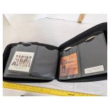 (2) DVD/CD holders 1 full of CDS (See picture for titles)