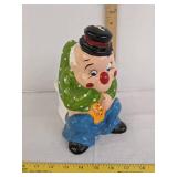 Pouting clown toilet brush holder