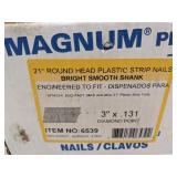 Open box of magnum pro 21 3" x .131 diamond point strip nails