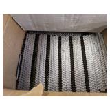 Open box of magnum pro 21 3" x .131 diamond point strip nails