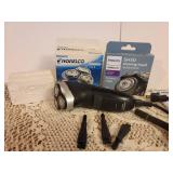 Norelco Electric Razor with Accessories (works)