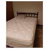 Queen Sized Bed with Headboard, Frame, Clean Pillowtop Mattress, and Box spring, Located in Basement