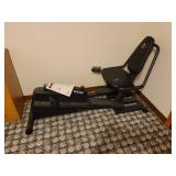 Pro-Form Rebel Recumbent Bike and Elliptical Crosstrainer Located in Basement