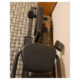 Pro-Form Rebel Recumbent Bike and Elliptical Crosstrainer Located in Basement