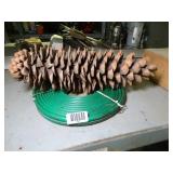 Large Pine Cone and Garden Hose