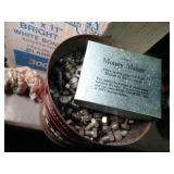 Tin Full of Nuts and Bolts and a Money Maker