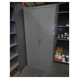 78" tall 2 Door Metal Cabinet w/ Boxes inside