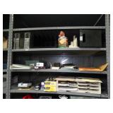 Misc. office supplies- stapler- paper- CD rack- turtle figurine- pen holder