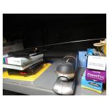 Misc. office supplies- stapler- paper- CD rack- turtle figurine- pen holder