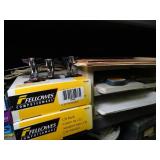 Misc. office supplies- stapler- paper- CD rack- turtle figurine- pen holder