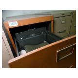 Two metal filing cabinets