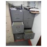 Two metal filing cabinets