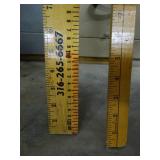 Lot of old wood yard sticks