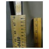 Lot of old wood yard sticks