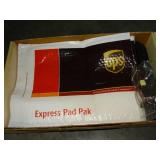 n95 masks, tape dispenser, packing envelopes, folders