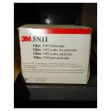 n95 masks, tape dispenser, packing envelopes, folders