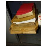 n95 masks, tape dispenser, packing envelopes, folders