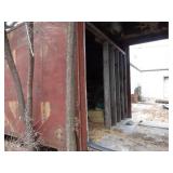 Scrap Metal Parts and Rack + Old Rusty Oil Cans