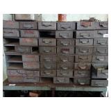 Metal Cabinet with Several Drawers Full of Contents