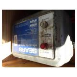 Pallet tub w/ Contents // Electric fence units / Misc tools