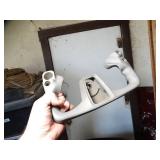 Contents on Shelf - Hood Ornament and Plane Controller - Oil Cans