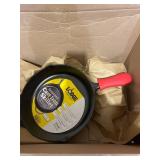 Lodge Pre-Seasoned Cast Iron Skillet with Assist Handle Holder, 12", Red Silicone