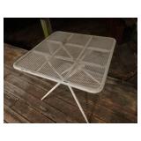 Folding metal patio table