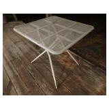 Folding metal patio table