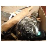 Box full of kitchen utensils