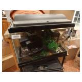 2 FISH TANKS W/ STAND & SUPPLIES. both are 10 gallon