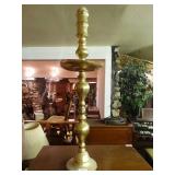 Tall brass candle holder