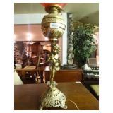 Brass cherub electric converted lamp