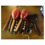 Hand held musical instruments