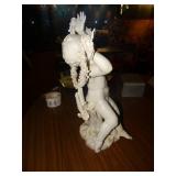 Porcelain cherub statue