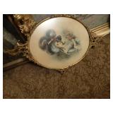 Several pieces of framed artwork