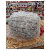 Joya 22x22x16 charcoal colored woven Pouf