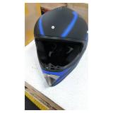 blue and black motorcycle helmet with gloves