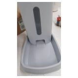 gray cat food dispenser