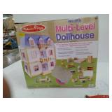 wooden multi level dollhouse