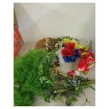 Faux flowers and 2 wicker baskets