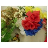 Faux flowers and 2 wicker baskets