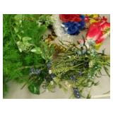 Faux flowers and 2 wicker baskets