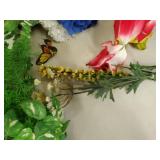 Faux flowers and 2 wicker baskets