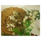 Faux flowers and 2 wicker baskets